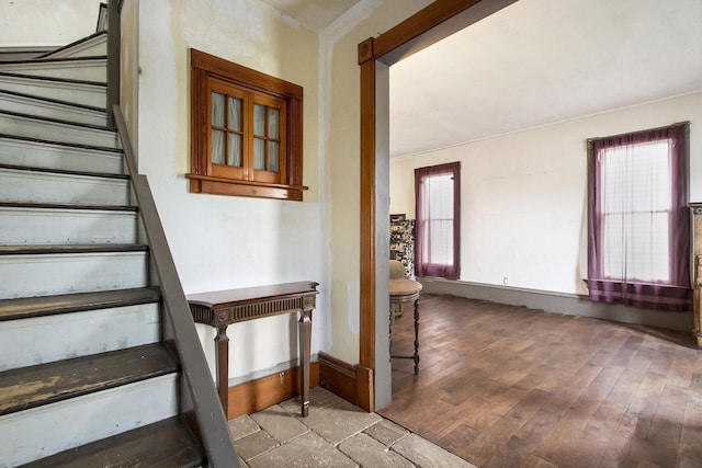 1122 Main St, Saint Joseph, MI 49085 - stairs with baseboards and wood finished floors
