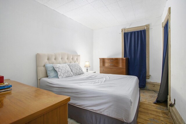 1122 Main St, Saint Joseph, MI 49085 - bedroom featuring wood-type flooring