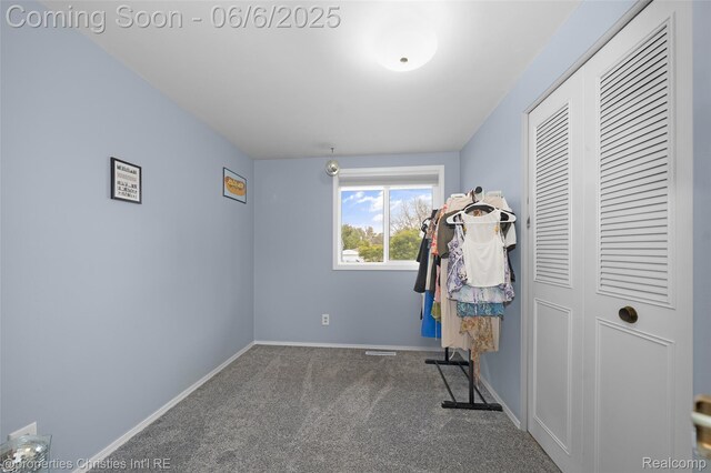 34143 Zimmer Dr, Sterling Heights, MI 48310 - bedroom featuring carpet floors, baseboards, and a closet