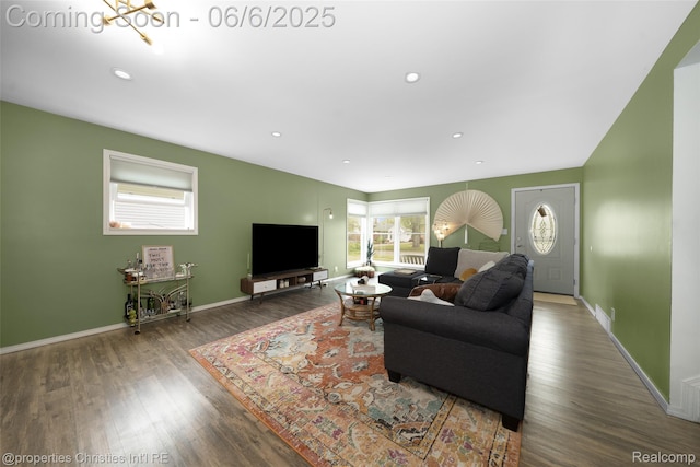 34143 Zimmer Dr, Sterling Heights, MI 48310 - living room with plenty of natural light, wood finished floors, recessed lighting, and baseboards
