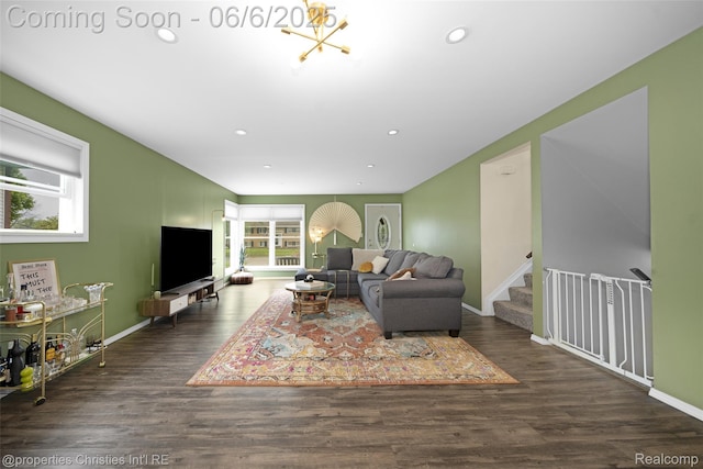 34143 Zimmer Dr, Sterling Heights, MI 48310 - living room featuring healthy amount of natural light, stairs, recessed lighting, wood finished floors, and a chandelier