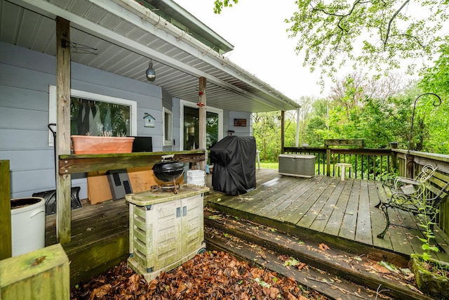 8324 Hagar Shore Rd, Watervliet, MI 49098 - wooden deck featuring a grill and central AC unit
