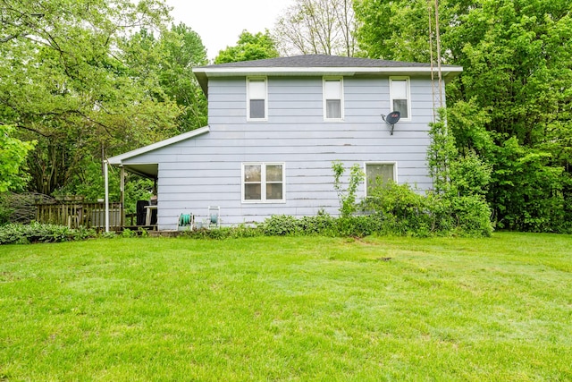 8324 Hagar Shore Rd, Watervliet, MI 49098 - back of property featuring a lawn