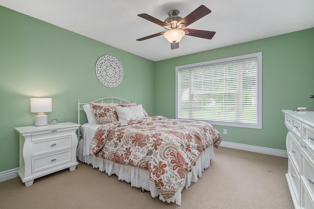 4132 Winding Way, Kalamazoo, MI 49004 - bedroom featuring light colored carpet, baseboards, and ceiling fan