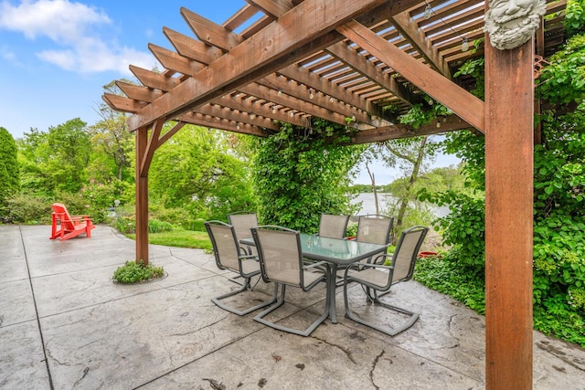 4132 Winding Way, Kalamazoo, MI 49004 - view of patio featuring outdoor dining space, a pergola, and a water view