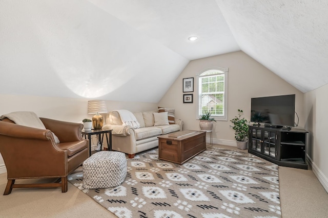 4132 Winding Way, Kalamazoo, MI 49004 - living room with vaulted ceiling, light colored carpet, and baseboards