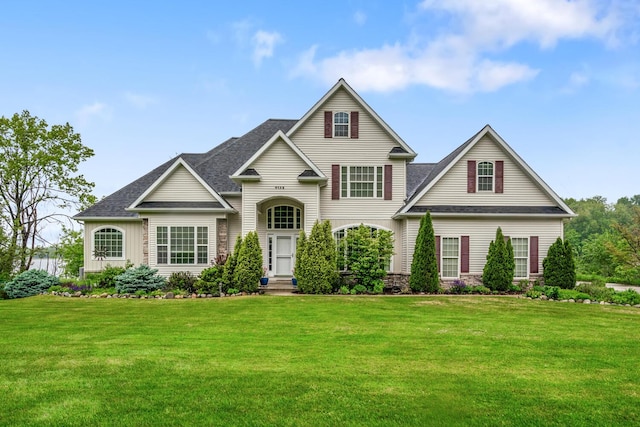 4132 Winding Way, Kalamazoo, MI 49004 - traditional home featuring a front yard and a shingled roof