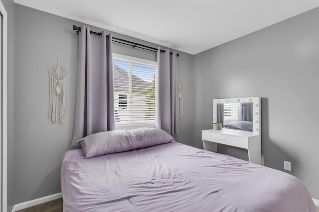 449 Corinth Cir, Dundee, MI 48131 - bedroom with carpet floors and baseboards