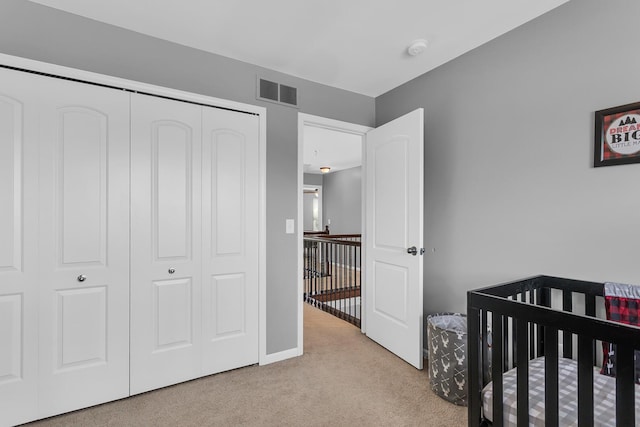 449 Corinth Cir, Dundee, MI 48131 - carpeted bedroom with a closet, a nursery area, and baseboards