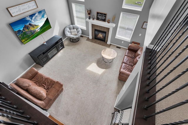 449 Corinth Cir, Dundee, MI 48131 - carpeted living area with a fireplace and baseboards