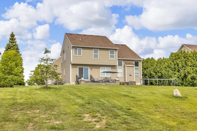 449 Corinth Cir, Dundee, MI 48131 - back of property featuring a yard and a patio area