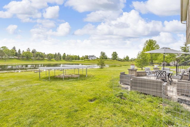 449 Corinth Cir, Dundee, MI 48131 - view of green lawn with a water view and a trampoline