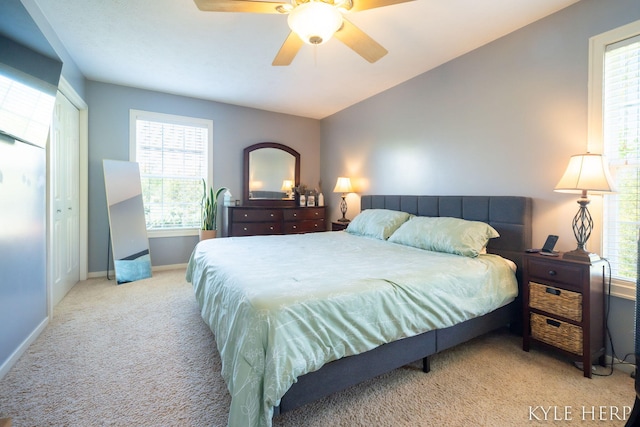 8718 Little Bend Ct, Middleville, MI 49333 - bedroom with carpet flooring, multiple windows, baseboards, and a ceiling fan