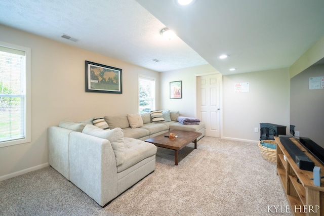 8718 Little Bend Ct, Middleville, MI 49333 - living room featuring light carpet, baseboards, and recessed lighting