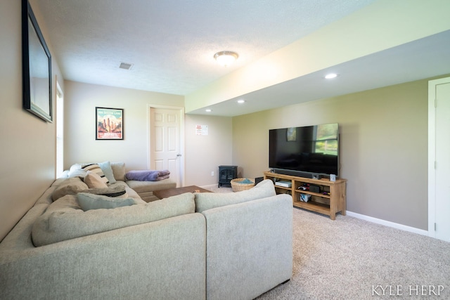 8718 Little Bend Ct, Middleville, MI 49333 - living room with a wood stove, light colored carpet, baseboards, and recessed lighting