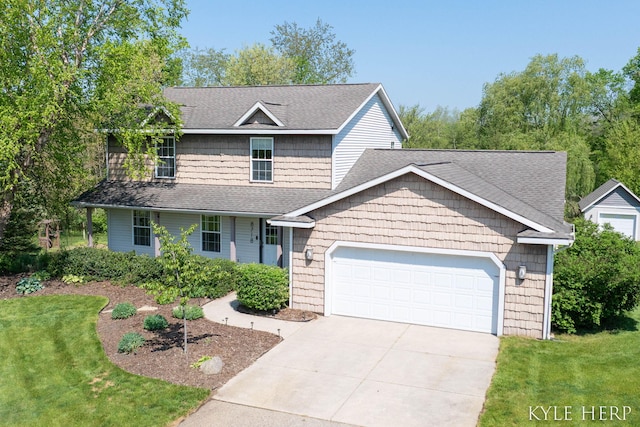 8718 Little Bend Ct, Middleville, MI 49333 - view of front facade with an attached garage, driveway, a front lawn, and a shingled roof