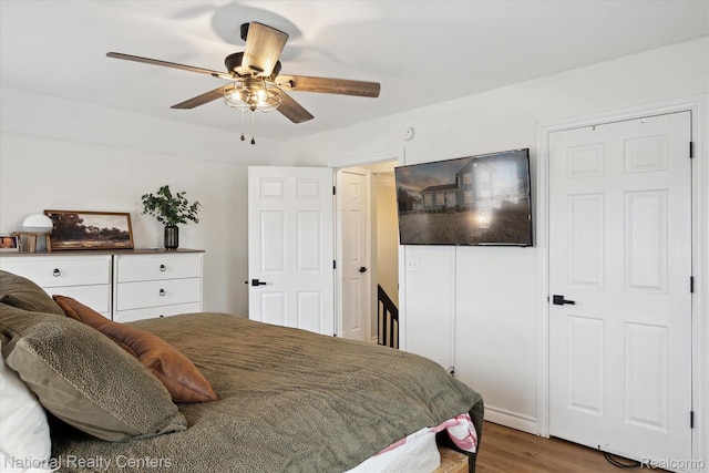 2020 Nicholson Rd, Fowlerville, MI 48836 - bedroom featuring wood finished floors and a ceiling fan
