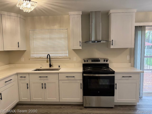 29054 Burning Tree Ln, Romulus, MI 48174 - kitchen with electric range, range hood, a sink, white cabinetry, and dark wood-type flooring