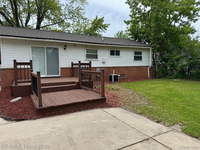 29054 Burning Tree Ln, Romulus, MI 48174 - rear view of property featuring central air condition unit, a yard, a wooden deck, a patio area, and brick siding