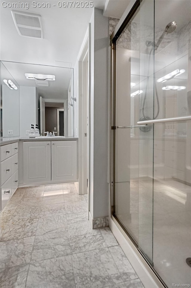 11404 Cedar Bend Dr, Pinckney, MI 48169 - full bathroom featuring vanity, a shower stall, and marble finish flooring