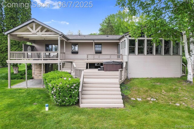 11404 Cedar Bend Dr, Pinckney, MI 48169 - back of property featuring stairway, a yard, a hot tub, and a wooden deck