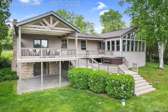 11404 Cedar Bend Dr, Pinckney, MI 48169 - rear view of house with stairs, a hot tub, a patio area, and a lawn