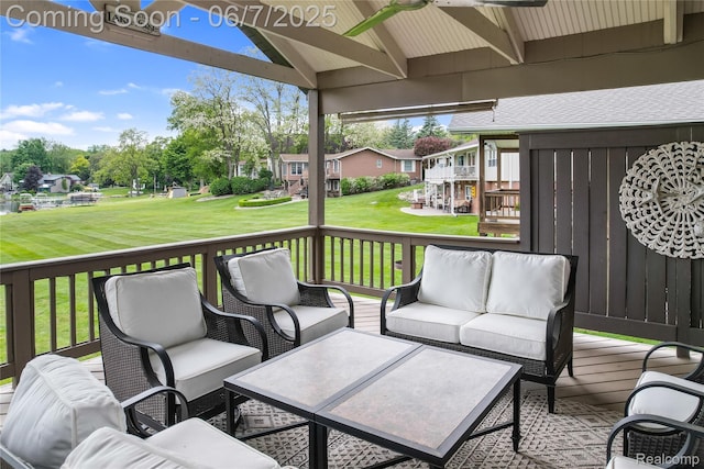 11404 Cedar Bend Dr, Pinckney, MI 48169 - wooden terrace featuring an outdoor hangout area, ceiling fan, and a yard