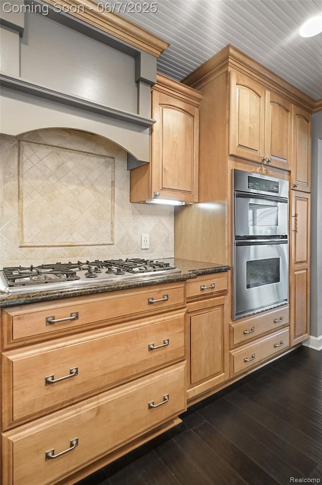 11404 Cedar Bend Dr, Pinckney, MI 48169 - kitchen with stainless steel appliances, dark stone counters, dark wood-style floors, and backsplash