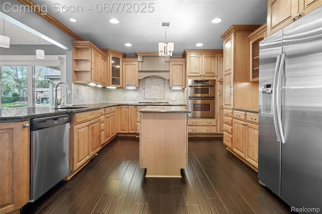 11404 Cedar Bend Dr, Pinckney, MI 48169 - kitchen with appliances with stainless steel finishes, a sink, recessed lighting, dark stone countertops, and dark wood-type flooring