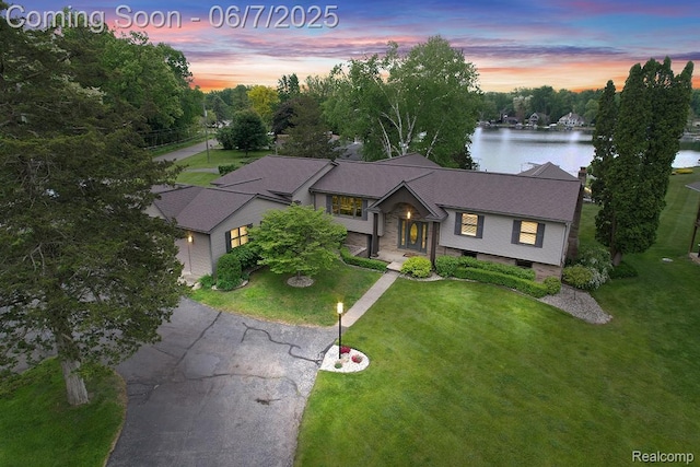 11404 Cedar Bend Dr, Pinckney, MI 48169 - raised ranch with a water view and a front yard