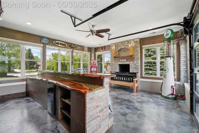 13525 Torrey Rd, Fenton, MI 48430 - sunroom / solarium with finished concrete floors, water heater, and a dry bar