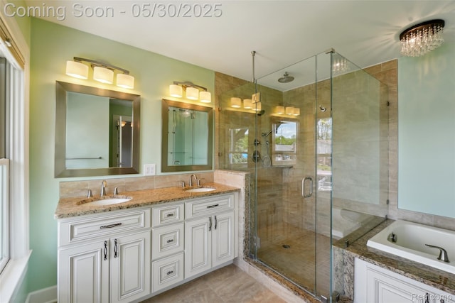 13525 Torrey Rd, Fenton, MI 48430 - full bathroom with a shower stall, double vanity, and a bath