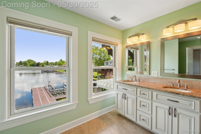 13525 Torrey Rd, Fenton, MI 48430 - bathroom with double vanity and baseboards