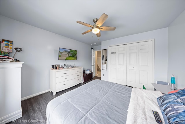 18615 Andrew Ln, New Boston, MI 48164 - bedroom featuring dark wood finished floors, baseboards, a closet, and a ceiling fan