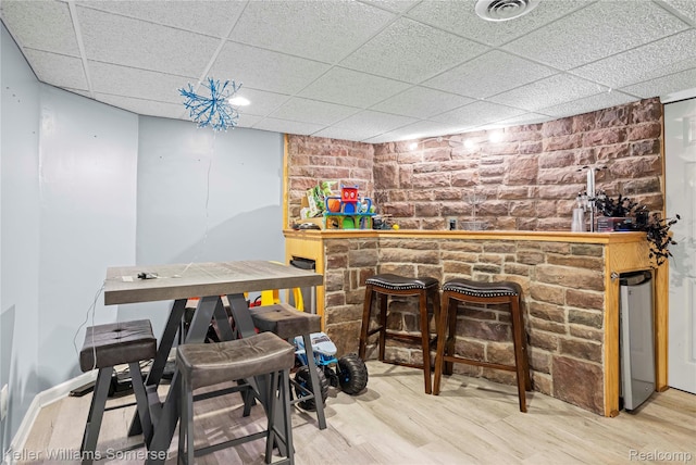 18615 Andrew Ln, New Boston, MI 48164 - indoor bar with wood finished floors and a drop ceiling
