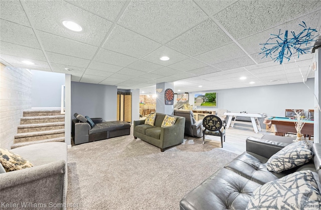 18615 Andrew Ln, New Boston, MI 48164 - carpeted living room featuring stairs, a drop ceiling, and recessed lighting