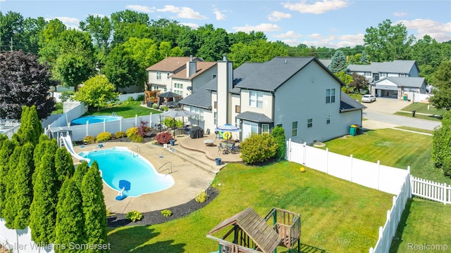 18615 Andrew Ln, New Boston, MI 48164 - back of property featuring a fenced backyard and a residential view