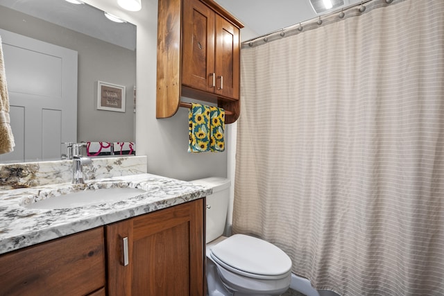 333 S W Silver Lake Rd, Michigan, MI 49685 - bathroom with vanity, toilet, and curtained shower