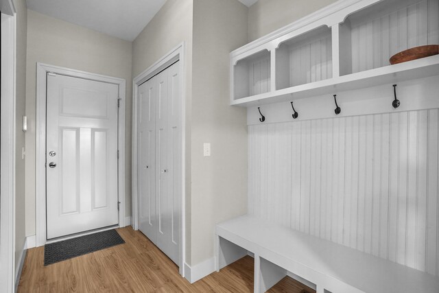 333 S W Silver Lake Rd, Michigan, MI 49685 - mudroom featuring light wood-type flooring and baseboards