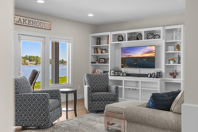 333 S W Silver Lake Rd, Michigan, MI 49685 - living area with wood finished floors, recessed lighting, and baseboards