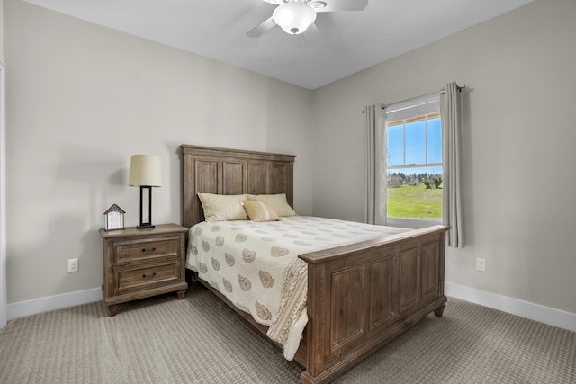 333 S W Silver Lake Rd, Michigan, MI 49685 - bedroom with baseboards, light carpet, and a ceiling fan