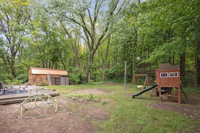 5245 Puetz Rd, Stevensville, MI 49127 - view of yard featuring a playground and a wooden deck