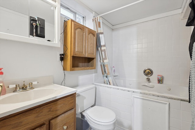 5245 Puetz Rd, Stevensville, MI 49127 - full bath featuring tiled shower / bath combo, toilet, and vanity