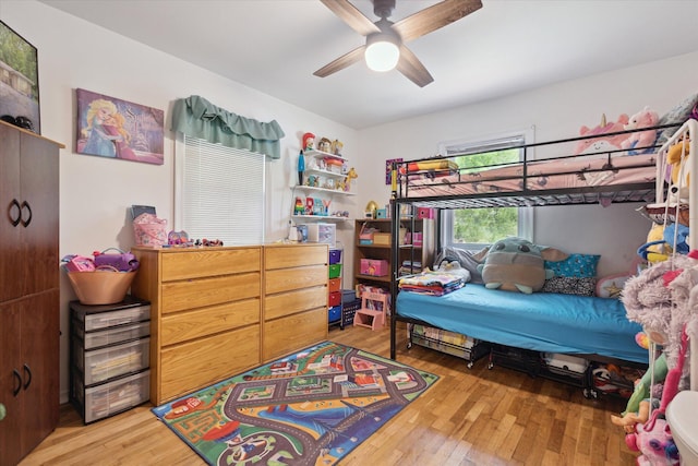 5245 Puetz Rd, Stevensville, MI 49127 - bedroom with hardwood / wood-style flooring and ceiling fan