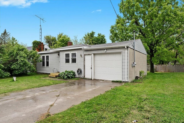 4020 Red Wing Dr, Flint, MI 48532 - ranch-style house with concrete driveway, a chimney, and an attached garage