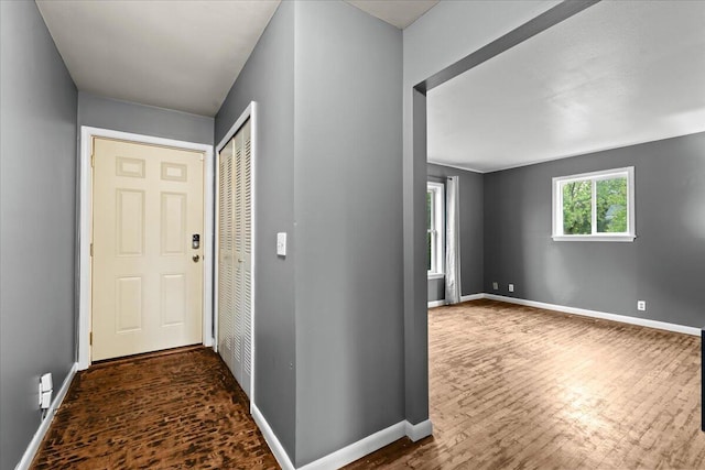 4020 Red Wing Dr, Flint, MI 48532 - entryway featuring baseboards and wood finished floors