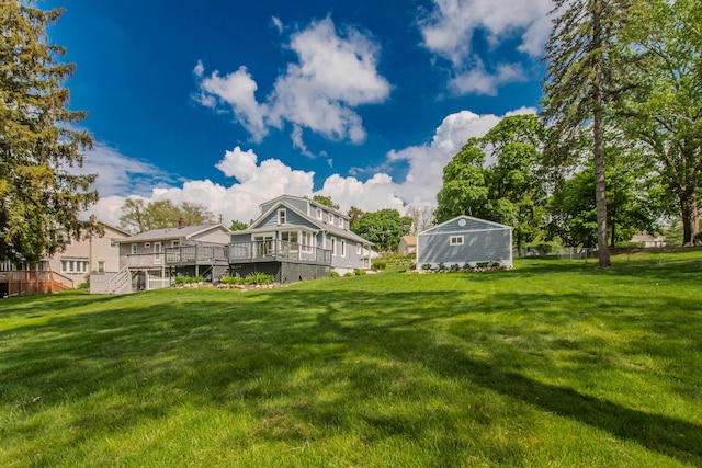 3063 Lansdowne Rd, Waterford, MI 48329 - view of grassy yard with a deck