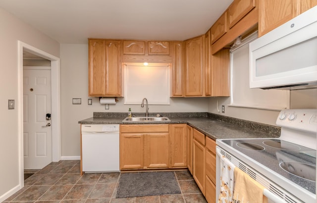 3063 Lansdowne Rd, Waterford, MI 48329 - kitchen featuring white appliances, a sink, and dark countertops