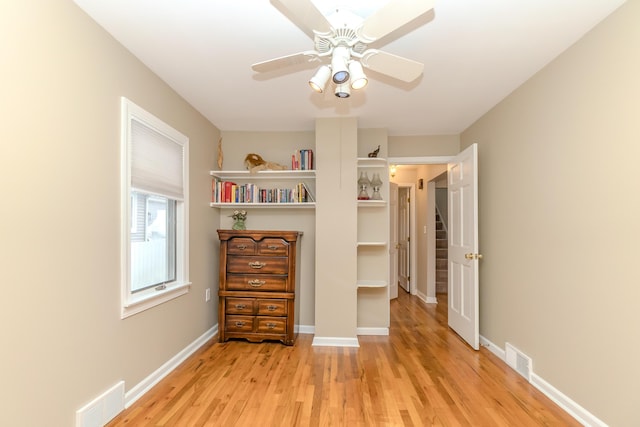 3063 Lansdowne Rd, Waterford, MI 48329 - bedroom with light wood-type flooring, baseboards, and a ceiling fan