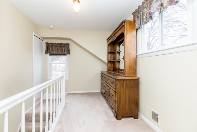 3063 Lansdowne Rd, Waterford, MI 48329 - hall with light carpet and baseboards